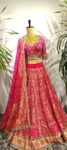 Pink Raidaana Bandhani Lehenga Set – Traditional Weaves Paired with a Hand-Embroidered Blouse