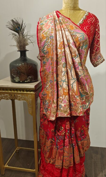 Where Meenakari meets mythology — this red Bandhani drape is a walk through a handwoven forest