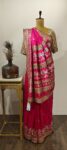 Royal Pink Banarasi Saree with Intricate Floral Zari and Opulent Zardozi work on the saree.