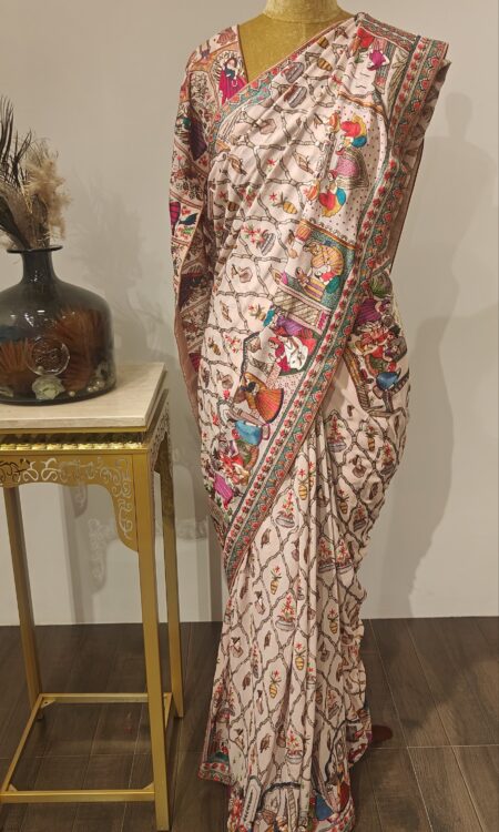 Ranglok – Iktara's Artistic Motif Saree in Pastel Base
Vibrant folk illustrations meet heritage elegance.