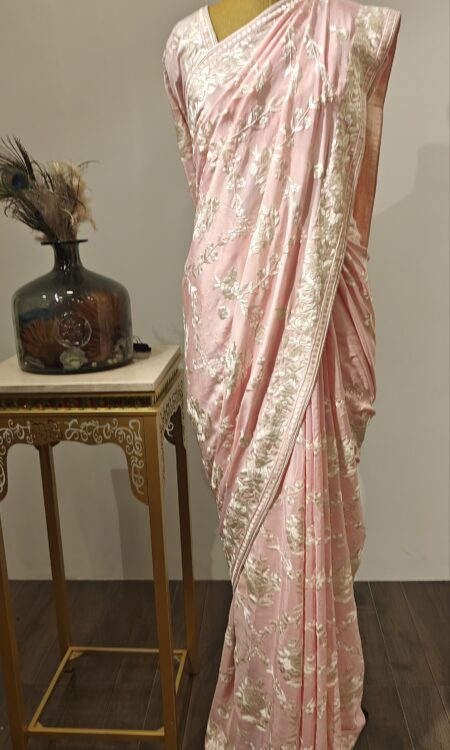Petal Veil – Soft Pink Saree with Intricate Floral Weave