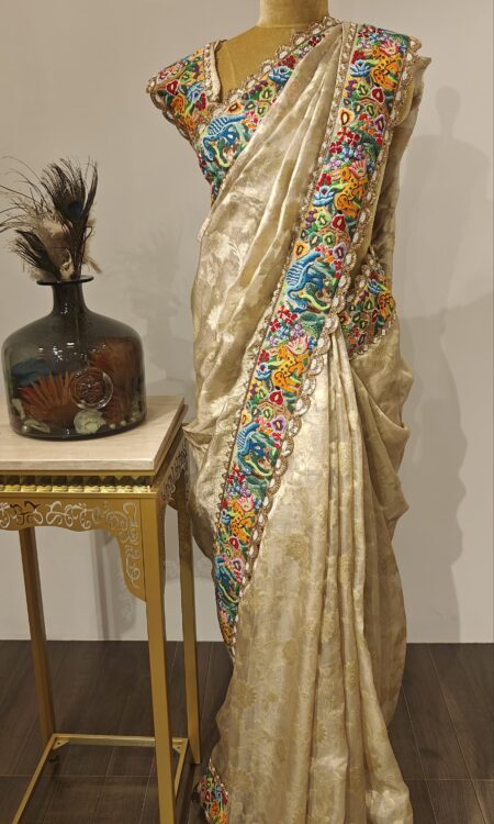 Golden Melody – Hand-Embroidered Tissue Saree with French Knot Detailing