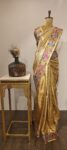 Pushpanjali – Golden Kanchi Saree with Woven Floral Charm