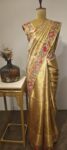 Kavya kanchi – Radiant Gold Drape with Artistic Border Finish