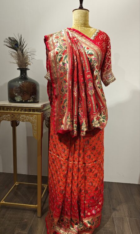 Surya Chandra:-Red to Orange Pelia Saree with Celestial Floral motif along with zari weaving.
