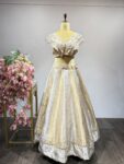 Nilofer: Soft Gold Striped Lehenga Set with Ornate Pearl-Edged Top
