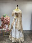 Sitaara Sitarein: Silver Lehenga Set Adorned with Intricate Zardozi, Pearls & Statement Tassels