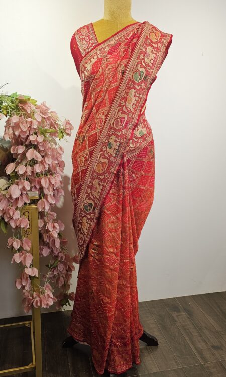 Red-orange Bandhani saree