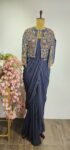 Navy blue colour drape saree pair with stylish jacket