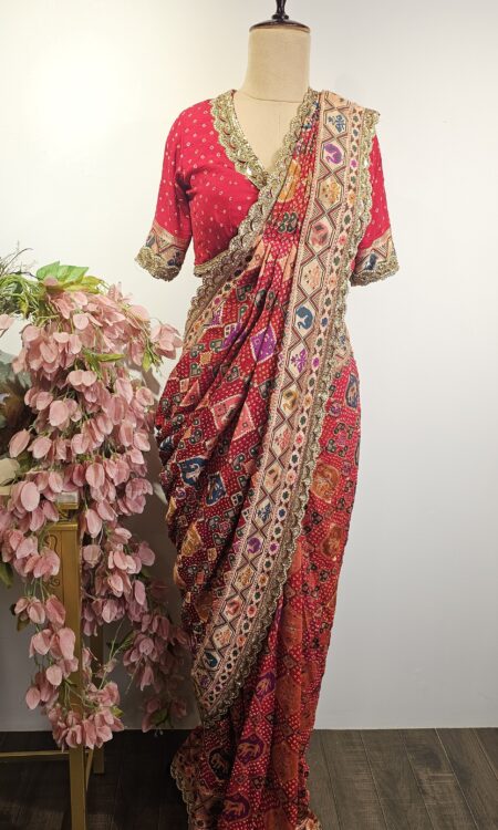 Red colour drape saree with stitched blouse