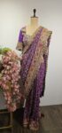 Wine colour drape saree with stitched blouse