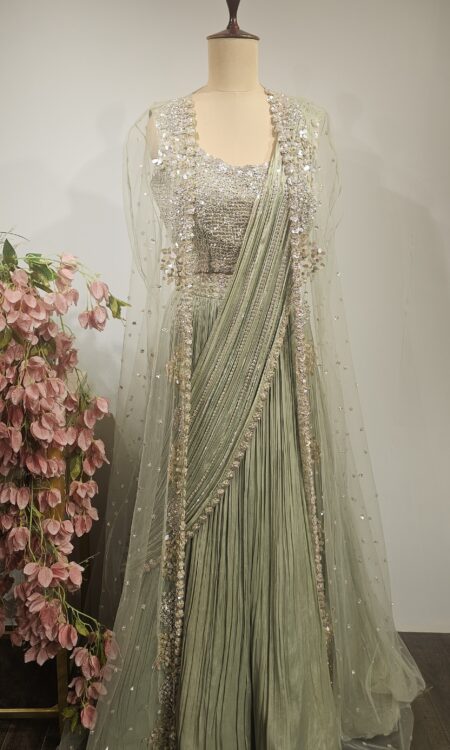 Pastel Green lehenga in drape style  paired with long jacket