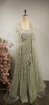 Pastel Green lehenga in drape style  paired with long jacket