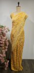 Yellow colour bandhani saree