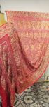 Red Bandhani Dupatta with complete zari and meenakari weaving all over the dupatta. (Odhana)