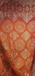 Red-orange pilia bandhani dupatta