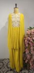 Lemon yellow cape top with flared pants