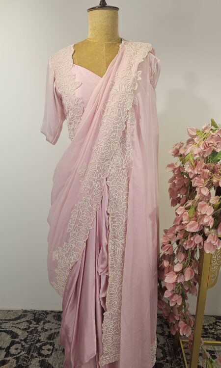Light pink colour drape saree with cape style
