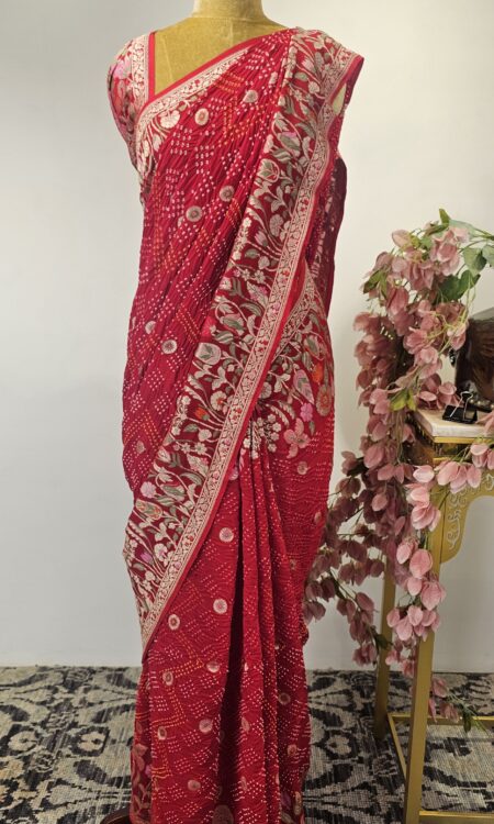 Red bandhani saree with floral motifs
