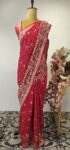 Red bandhani saree with floral motifs