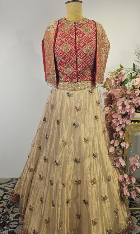 Gold colour tissue lehanga with flying sleeves blouse