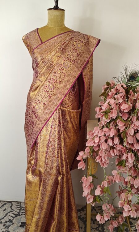 Gold color Kanchi silk saree with purple zari border
