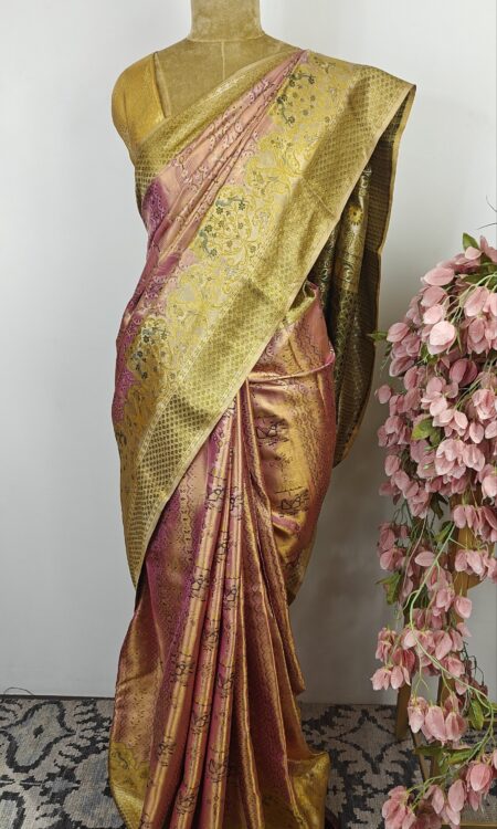 Pink colour Kanchi saree with pastel green border