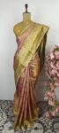 Pink colour Kanchi saree with pastel green border