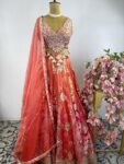 Orange colour Banarasi silk brocade lehenga