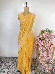 Yellow colour pure Georgette bandhani saree