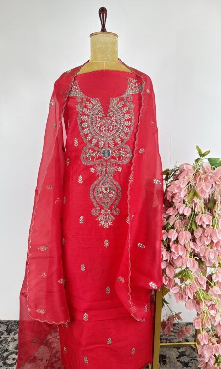 Red colour unstitched suit