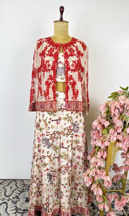 White colour top and flared pants with cape