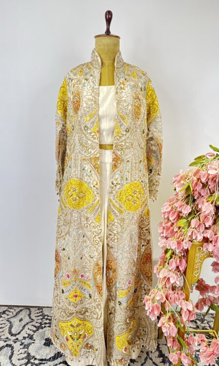 Half white top and pants with embroidered jacket