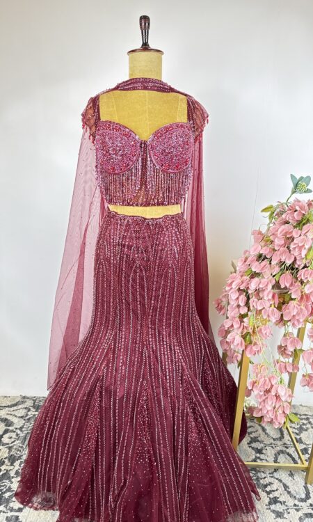 Maroon colour fitted skirt with buster