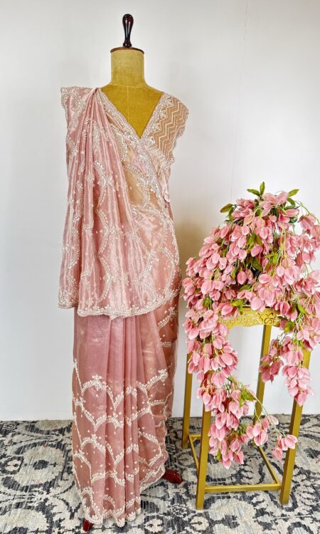 Powder pink colour tissue saree