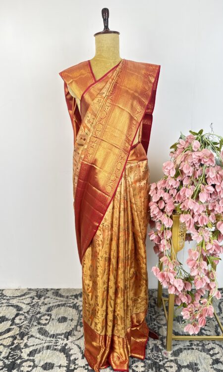 Gold and orange kanchi tissue saree