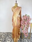 Gold and orange kanchi tissue saree