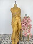 Mustard colour tussar saree with cross stitch embroidery