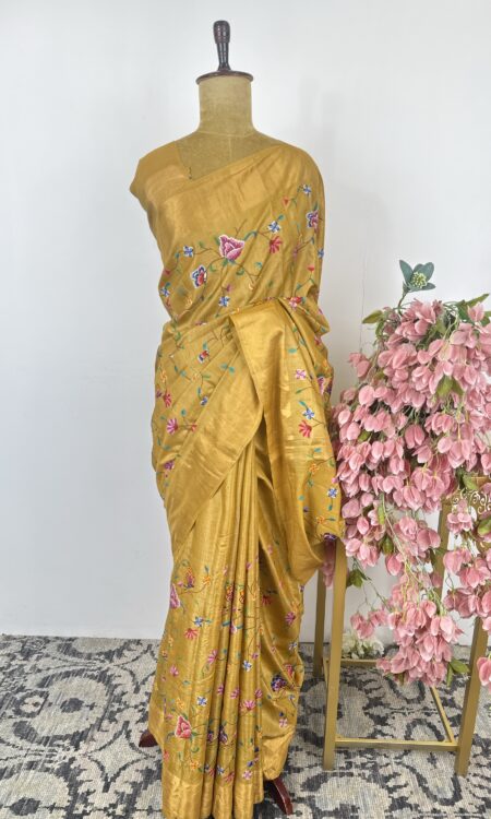 Mustard colour tussar saree with cross stitch embroidery
