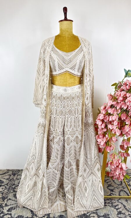 Beige colour flared pants with jacket and dupatta