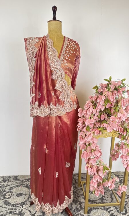 Rust orange colour tissue saree