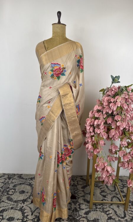 Beige colour tussar saree with cross stitch embroidery