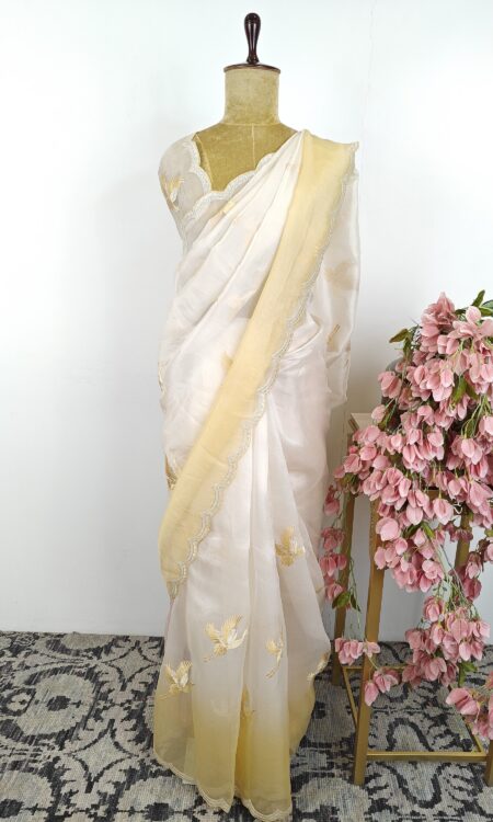 White and yellow organza saree