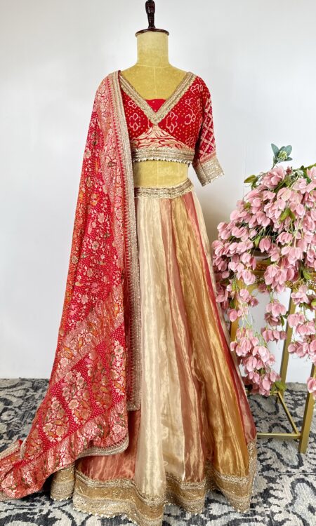 Rust orange lehenga with Bandhani pilia dupatta