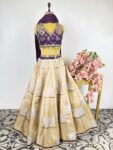 Gold and silver tissue lehenga with purple colour blouse