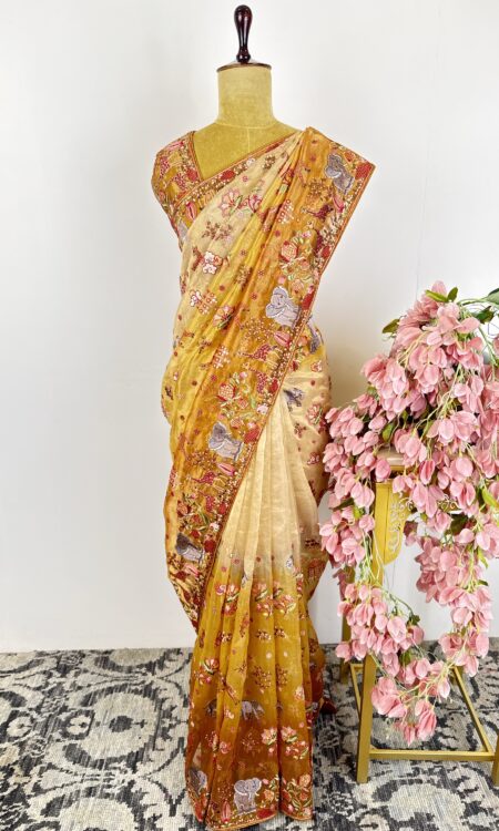 Beige to orange tissue saree