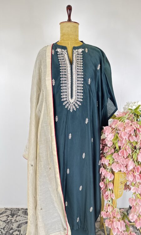 Bottle green colour semi stitched suit