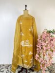 Mustard yellow colour organza unstitched suit