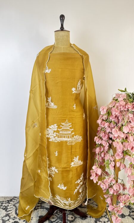 Mustard yellow colour organza unstitched suit