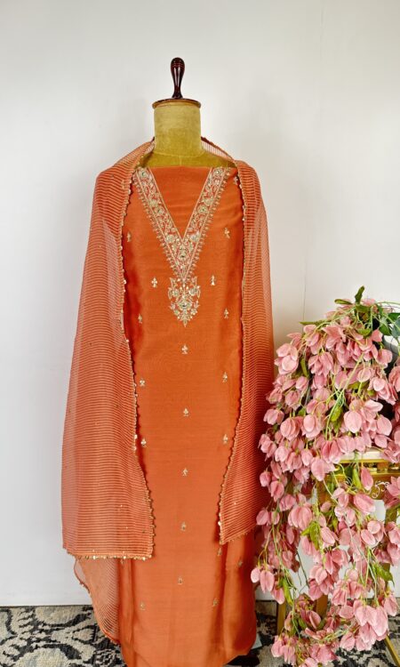 Orange colour Chanderi unstitched suit